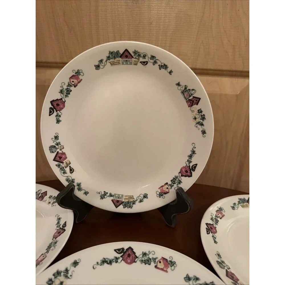 4 Corelle Garden Home Luncheon Plates Birdhouse 8.5”. Good Condition. Ships Fast